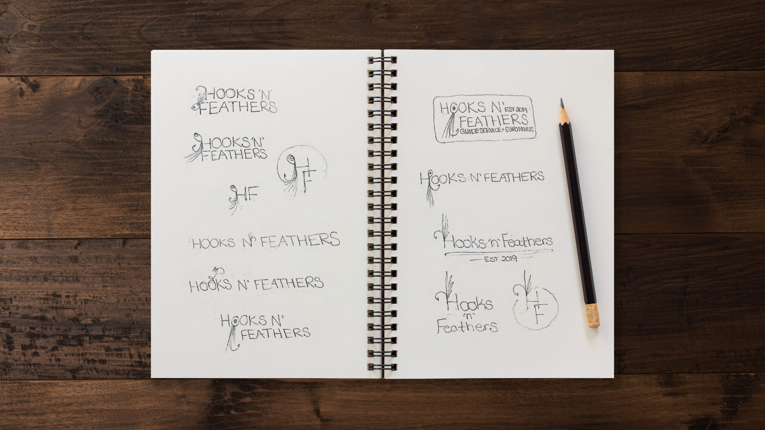 Hooks n' Feathers logo sketches.